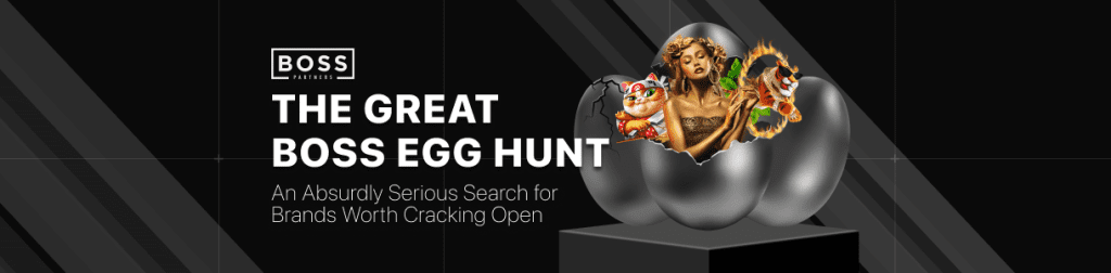Boss Partners Easter campaign main banner featuring a cracked metallic egg revealing vivid characters and a golden woman, symbolizing the affiliate brand lineup.