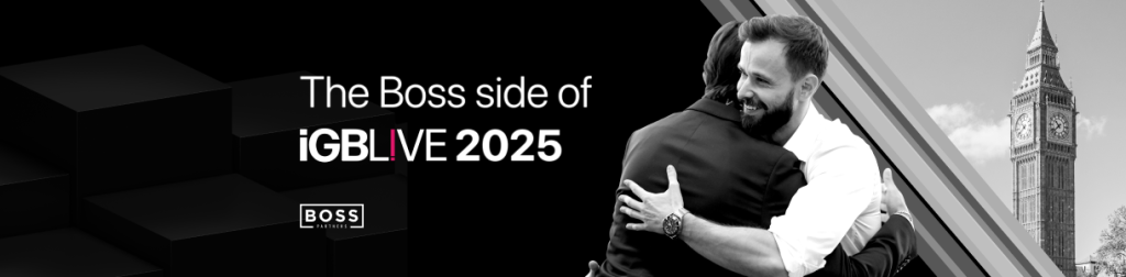 Two people from Boss Partners embracing at iGB L!VE 2025 in London, with Big Ben in the background.